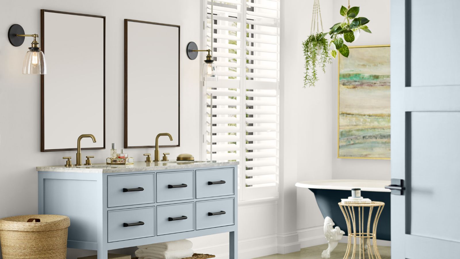 A blue and white Sherwin-Williams bathroom