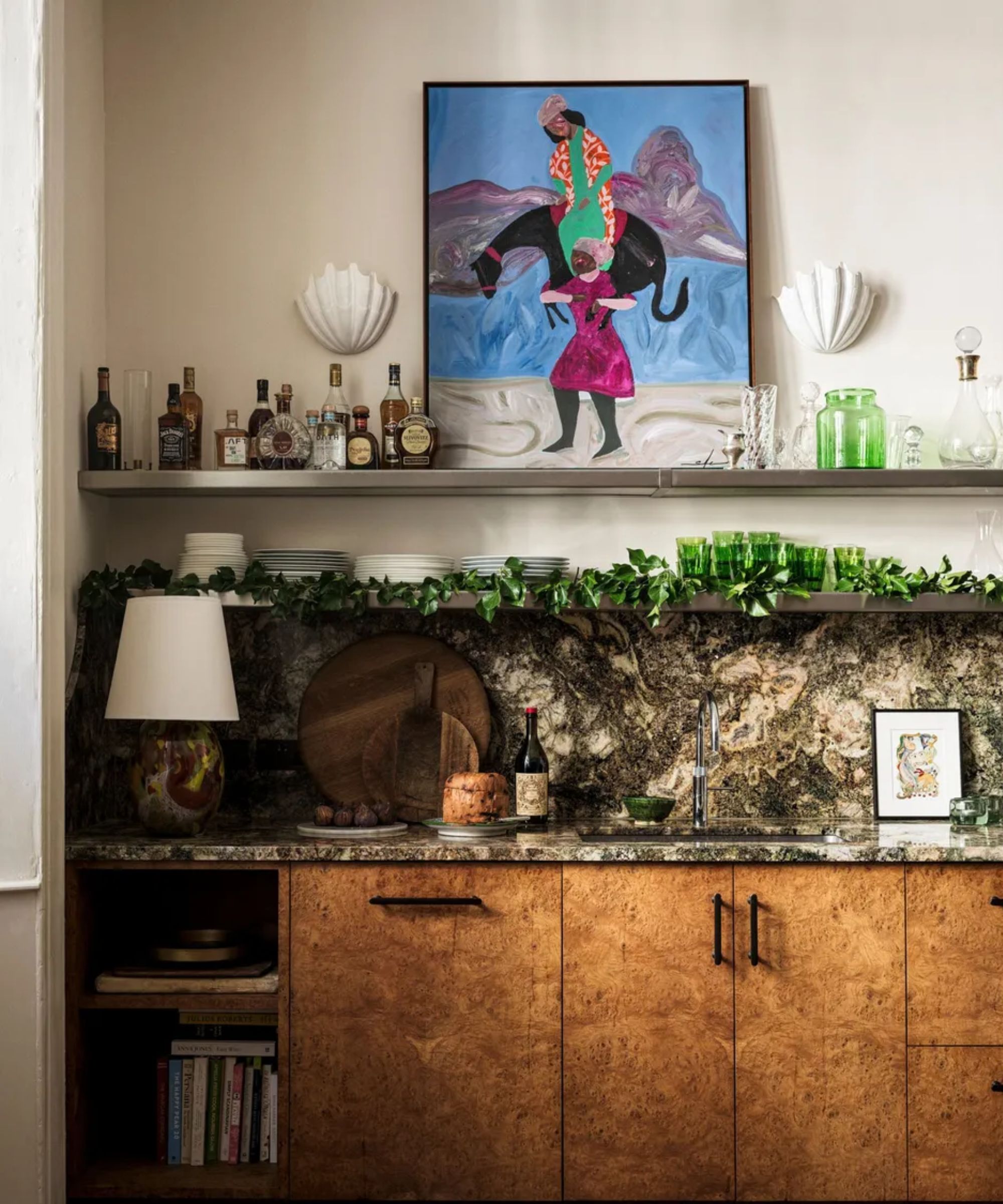 Close up of kitchen countertops and shelving decorated for Christmas